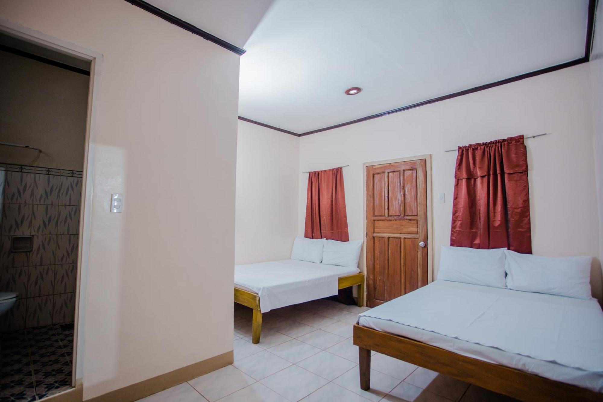 Durhan White Beach Resort Powered By Cocotel Tabuelan Exterior photo